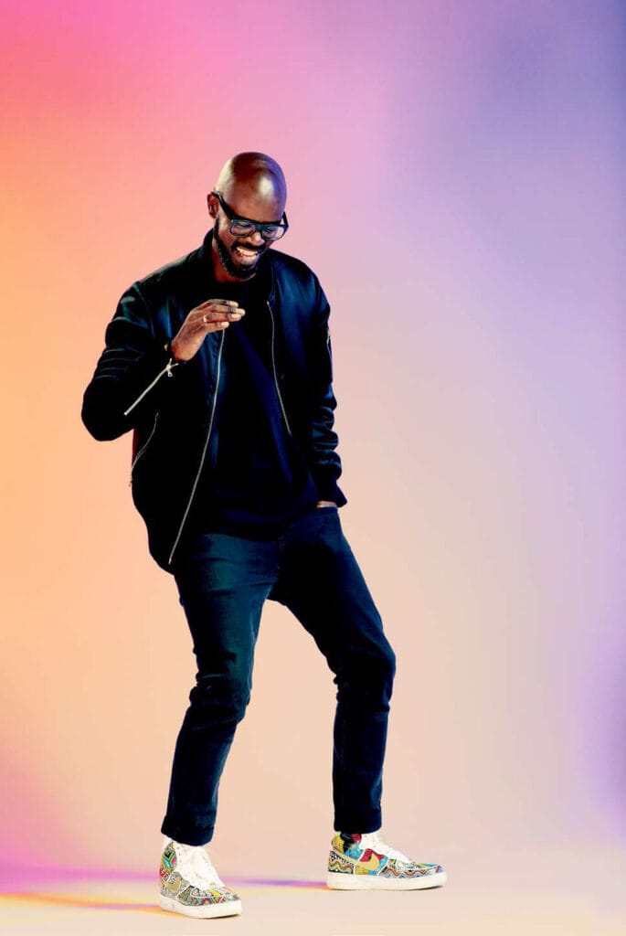 Black Coffee performing a 360-degree orchestral Afro-house set at the Arènes de Nîmes in France during his 2026 live concert