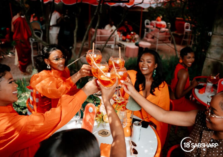 Guests enjoying Brutal Fruit Spritzer L’Orange Rossa at Villa Rossa Johannesburg during a luxury lifestyle launch event hosted by Zola Nombona